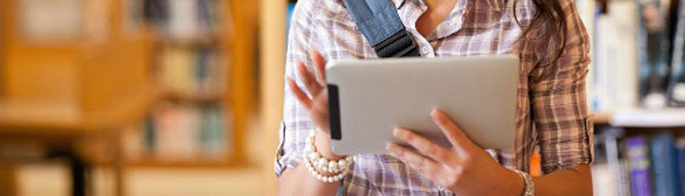 Student using tablet device.