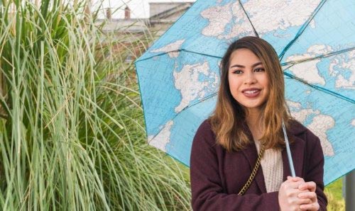 student with an umbrella